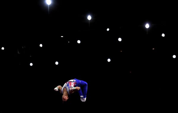 Артур Далалоян (Россия) в командном многоборье среди мужчин на чемпионате мира по спортивной гимнастике в Штутгарте Артур Далалоян (Россия) в командном многоборье среди мужчин на чемпионате мира по спортивной гимнастике в Штутгарте