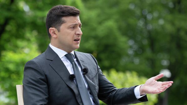 Президент Украины Владимир Зеленский во время пресс-конференции, посвященной первой годовщине пребывания на посту Президент Украины Владимир Зеленский во время пресс-конференции, посвященной первой годовщине пребывания на посту