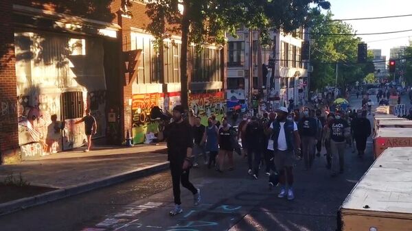 Протестующие в Сиэтле Протестующие в Сиэтле