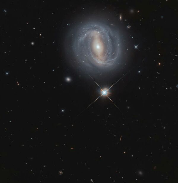 Спиральная галактика с перемычкой NGC 4907 (SBb) в созвездии Волосы Вероники Спиральная галактика с перемычкой NGC 4907 (SBb) в созвездии Волосы Вероники