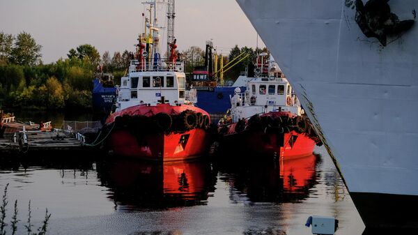 Буксиры в рыбном порту Архангельска Буксиры в рыбном порту Архангельска