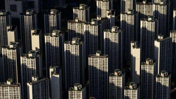 Вид со 123-этажного сверхвысокого небоскреба Lotte World Tower в Сеуле Вид со 123-этажного сверхвысокого небоскреба Lotte World Tower в Сеуле