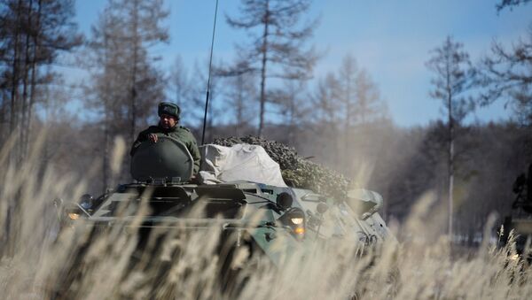 Военнослужащий на учениях в Восточном военном округе. Архивное фото Военнослужащий на учениях в Восточном военном округе. Архивное фото