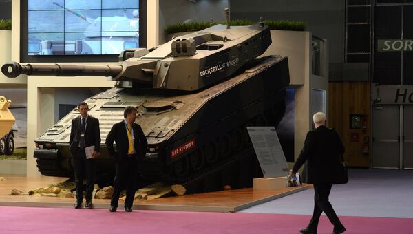 Стенд бельгийской компании Cockerill на выставке Eurosatory 2014. Архивное фото Стенд бельгийской компании Cockerill на выставке Eurosatory 2014. Архивное фото