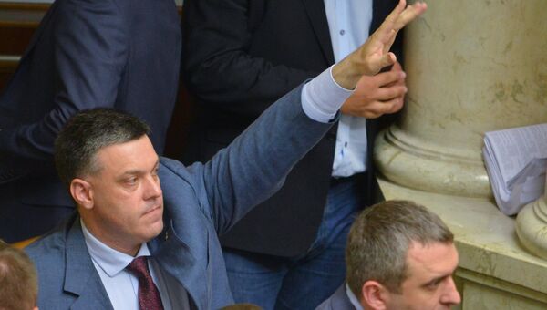 Лидер националистической партии Свобода Олег Тягнибок на заседании Рады . Архивное фото Лидер националистической партии Свобода Олег Тягнибок на заседании Рады . Архивное фото
