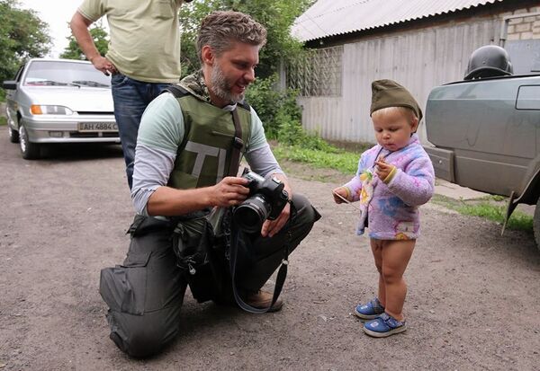 Фотограф МИА Россия сегодня Андрей Стенин