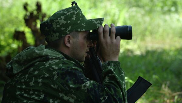 Ополченцы ДНР во время боевых действий. Архивное фото Ополченцы ДНР во время боевых действий. Архивное фото