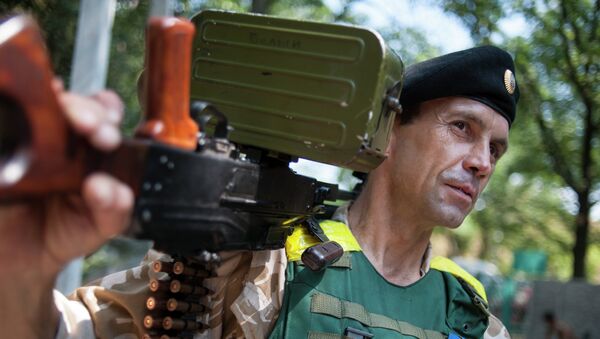 Боец батальона Донбасс возле Донецка. 12 августа 2014 Боец батальона Донбасс возле Донецка. 12 августа 2014