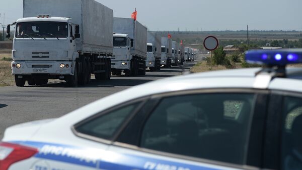 Первые КамАЗы с гуманитарной помощью из РФ прибыли к КПП на границе с Украиной Первые КамАЗы с гуманитарной помощью из РФ прибыли к КПП на границе с Украиной