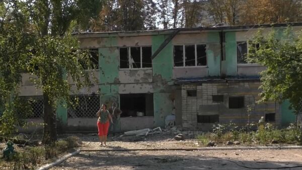 Разрушенная площадка детского сада после обстрела Донецка Разрушенная площадка детского сада после обстрела Донецка