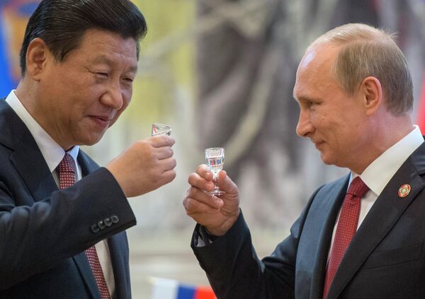 Президент России Владимир Путин и председатель Китайской народной республики Си Цзиньпин Президент России Владимир Путин и председатель Китайской народной республики Си Цзиньпин