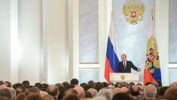 Президент России Владимир Путин во время оглашения ежегодного послания президента Российской Федерации Федеральному Собранию. Архивное фото Президент России Владимир Путин во время оглашения ежегодного послания президента Российской Федерации Федеральному Собранию. Архивное фото