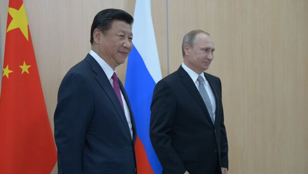 Президент Российской Федерации Владимир Путин и Председатель Китайской Народной Республики Си Цзиньпин во время встречи в Уфе Президент Российской Федерации Владимир Путин и Председатель Китайской Народной Республики Си Цзиньпин во время встречи в Уфе