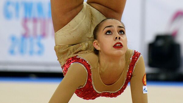 Маргарита Мамун выполняет упражнения с мячом на чемпионате мира по художественной гимнастике в немецком Штутгарте Маргарита Мамун выполняет упражнения с мячом на чемпионате мира по художественной гимнастике в немецком Штутгарте
