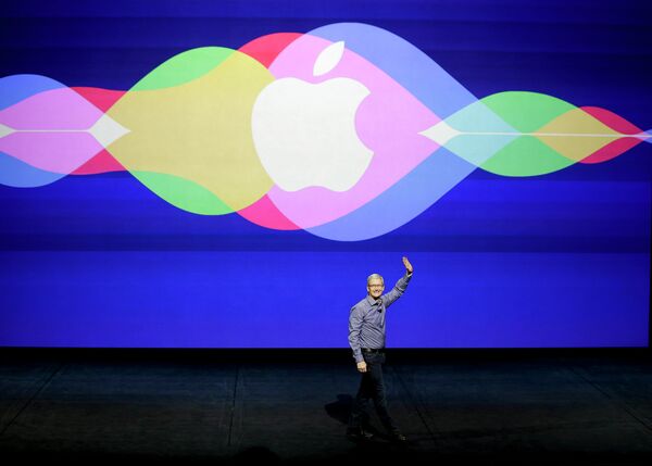 Генеральный директор Apple Тим Кук во время презентации в Сан-Франциско Генеральный директор Apple Тим Кук во время презентации в Сан-Франциско