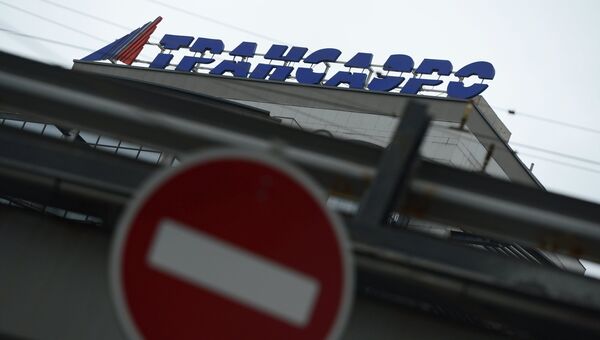 Логотип авиакомпании Трансаэро на здании в Москве. Архивное фото Логотип авиакомпании Трансаэро на здании в Москве. Архивное фото