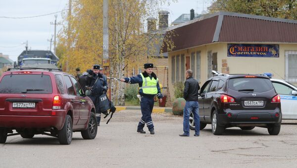 Полиция оцепила деревню Тимошкино, где может скрываться Амиран Георгадзе Полиция оцепила деревню Тимошкино, где может скрываться Амиран Георгадзе