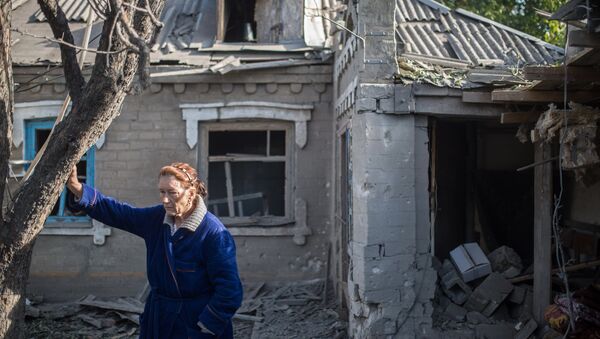 Последствия обстрела поселка Александровка в Донецкой области. Архивное фото Последствия обстрела поселка Александровка в Донецкой области. Архивное фото