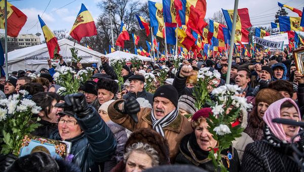 Участники акции протеста оппозиции в Кишиневе Участники акции протеста оппозиции в Кишиневе