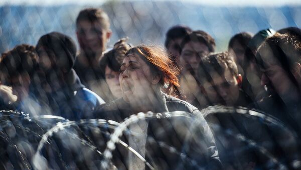 Беженцы на границе Греции и Македонии. Архивное фото Беженцы на границе Греции и Македонии. Архивное фото