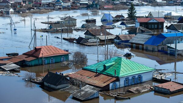 Частные дома в городе Ишим Тюменской области, подтопленные в результате сильного поднятия воды в реках Ишим и Карасуль Частные дома в городе Ишим Тюменской области, подтопленные в результате сильного поднятия воды в реках Ишим и Карасуль