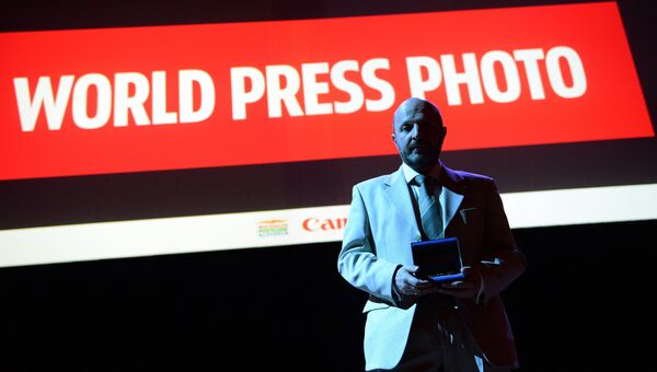 Фотокорреспонденту МИА Россия сегодня В. Песне вручили премию World Press Photo Фотокорреспонденту МИА Россия сегодня В. Песне вручили премию World Press Photo