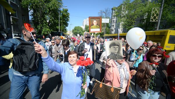 Участники акции Бессмертный полк во время шествия по улицам Киева. Участники акции Бессмертный полк во время шествия по улицам Киева.