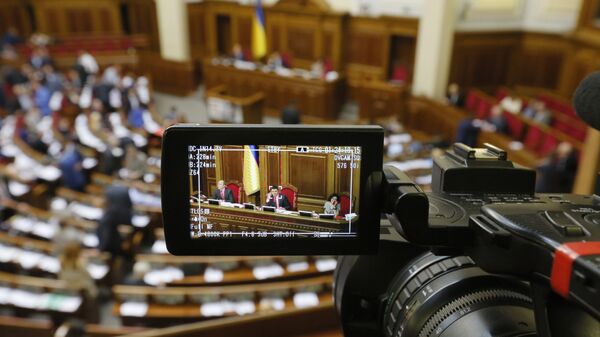 Журналист с камерой в Верховной раде Украины Журналист с камерой в Верховной раде Украины
