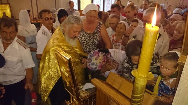 Севастопольцы прикладываются к деснице Андрея Первозванного Севастопольцы прикладываются к деснице Андрея Первозванного