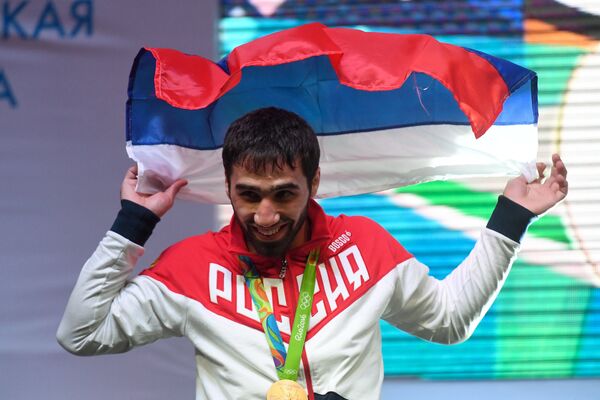 Российский дзюдоист Хасан Халмурзаев, завоевавший золотую медаль в мужском турнире по дзюдо Российский дзюдоист Хасан Халмурзаев, завоевавший золотую медаль в мужском турнире по дзюдо