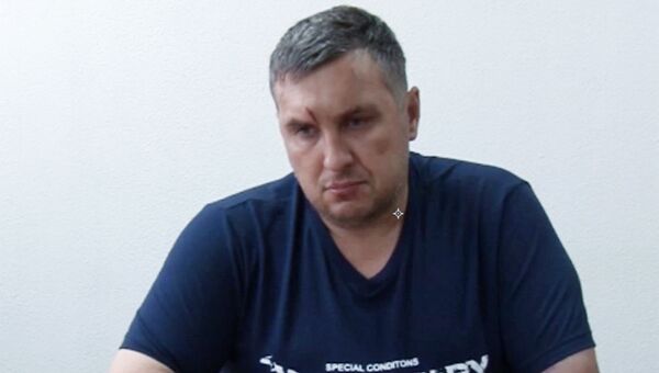 Подозреваемый в подготовке терактов в Крыму Евгений Панов во время допроса Подозреваемый в подготовке терактов в Крыму Евгений Панов во время допроса