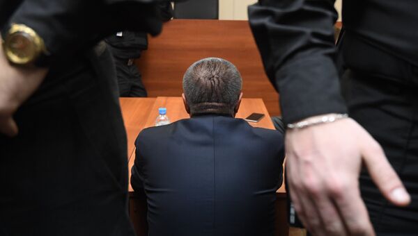 Министр экономического развития РФ Алексей Улюкаев в здании Басманного суда города Москвы Министр экономического развития РФ Алексей Улюкаев в здании Басманного суда города Москвы