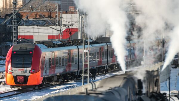 Модернизированный электропоезд Ласточка в депо Подмосковная для Московского центрального кольца. Архивное фото Модернизированный электропоезд Ласточка в депо Подмосковная для Московского центрального кольца. Архивное фото