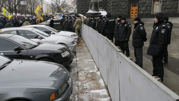 Участники на акции протеста возле здания правительства Украины в Киеве. 24 января 2017 Участники на акции протеста возле здания правительства Украины в Киеве. 24 января 2017