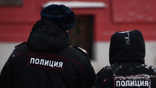 Сотрудники полиции на улице Москвы. Архивное фото Сотрудники полиции на улице Москвы. Архивное фото