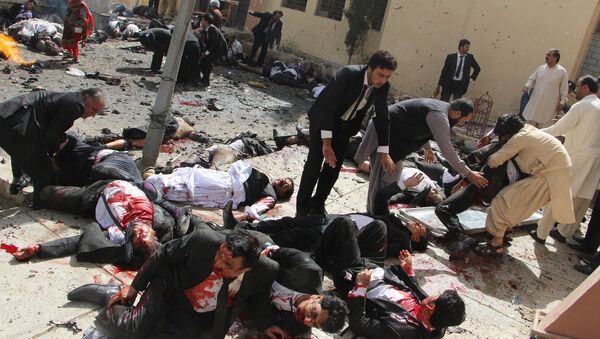 Pakistan Bomb Blast фотографа Jamal Taraqai занявшего первое место в категории Горячие новости в фотоконкурсе World Press Photo Pakistan Bomb Blast фотографа Jamal Taraqai занявшего первое место в категории Горячие новости в фотоконкурсе World Press Photo