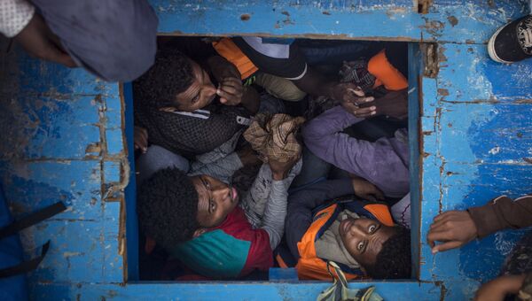 Mediterranean Migration фотографа Mathieu Willcocks занявшего третье место в категории Горячие новости в фотоконкурсе World Press Photo Mediterranean Migration фотографа Mathieu Willcocks занявшего третье место в категории Горячие новости в фотоконкурсе World Press Photo