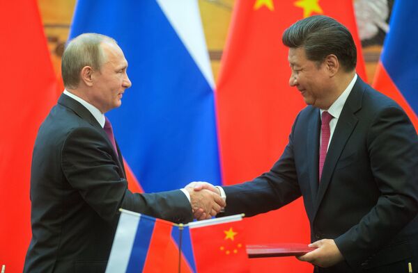 Президент России Владимир Путин и председатель Китайской Народной Республики (КНР) Си Цзиньпин Президент России Владимир Путин и председатель Китайской Народной Республики (КНР) Си Цзиньпин