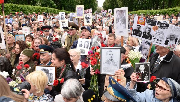 Участники акции Бессмертный полк в Киеве. Архивное фото Участники акции Бессмертный полк в Киеве. Архивное фото