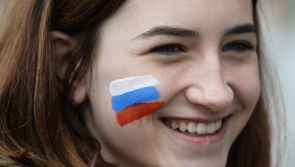 Участница праздничного митинга в честь Дня России на площади Ленина в Новосибирске. 12 июня 2017 Участница праздничного митинга в честь Дня России на площади Ленина в Новосибирске. 12 июня 2017