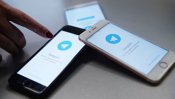 Мессенджер Telegram на экране телефона. Архивное фото Мессенджер Telegram на экране телефона. Архивное фото