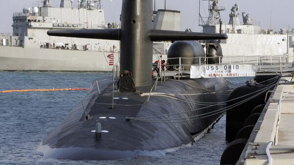 Подводная лодка ВМФ США класса Ohio на военно-морской базе в Пусане, Южная Корея Подводная лодка ВМФ США класса Ohio на военно-морской базе в Пусане, Южная Корея