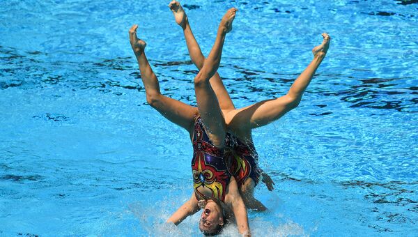Спортсменки сборной России выступают с произвольной программой в финальных соревнованиях по синхронному плаванию среди групп на XVII чемпионате мира по водным видам спорта в Будапеште Спортсменки сборной России выступают с произвольной программой в финальных соревнованиях по синхронному плаванию среди групп на XVII чемпионате мира по водным видам спорта в Будапеште