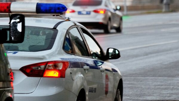 Автомобили полиции на улице Москвы. Архивное фото Автомобили полиции на улице Москвы. Архивное фото
