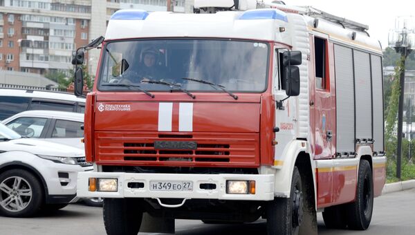 Сотрудники МЧС во время пожарно-тактических учений. Архивное фото Сотрудники МЧС во время пожарно-тактических учений. Архивное фото