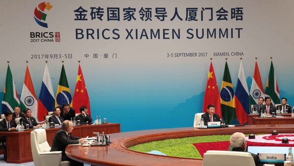 Президент РФ Владимир Путин во время встречи лидеров БРИКС в расширенном составе с участием делегаций. 4 сентября 2017 Президент РФ Владимир Путин во время встречи лидеров БРИКС в расширенном составе с участием делегаций. 4 сентября 2017