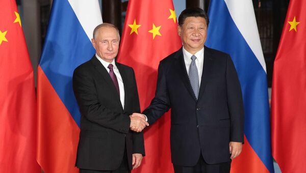 3 сентября 2017. Президент РФ Владимир Путин и председатель КНР Си Цзиньпин во время встречи на полях саммита БРИКС в Сямэне 3 сентября 2017. Президент РФ Владимир Путин и председатель КНР Си Цзиньпин во время встречи на полях саммита БРИКС в Сямэне