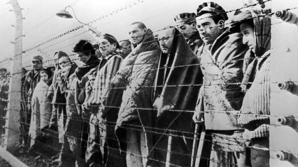 Узники концентрационного лагеря Освенцим Узники концентрационного лагеря Освенцим