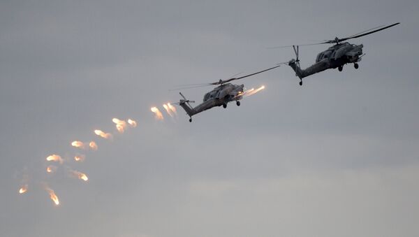 Вертолеты Ка-52 ВКС России во время учений вооруженных сил России и Белоруссии Запад-2017. Архивное фото Вертолеты Ка-52 ВКС России во время учений вооруженных сил России и Белоруссии Запад-2017. Архивное фото