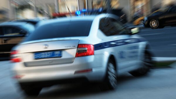 Автомобиль полиции на улице Москвы. Архивное фото Автомобиль полиции на улице Москвы. Архивное фото